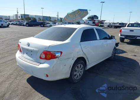 2009 Toyota Corolla Le z USA, uszkodzony, nr VIN JTDBL40EX99022714